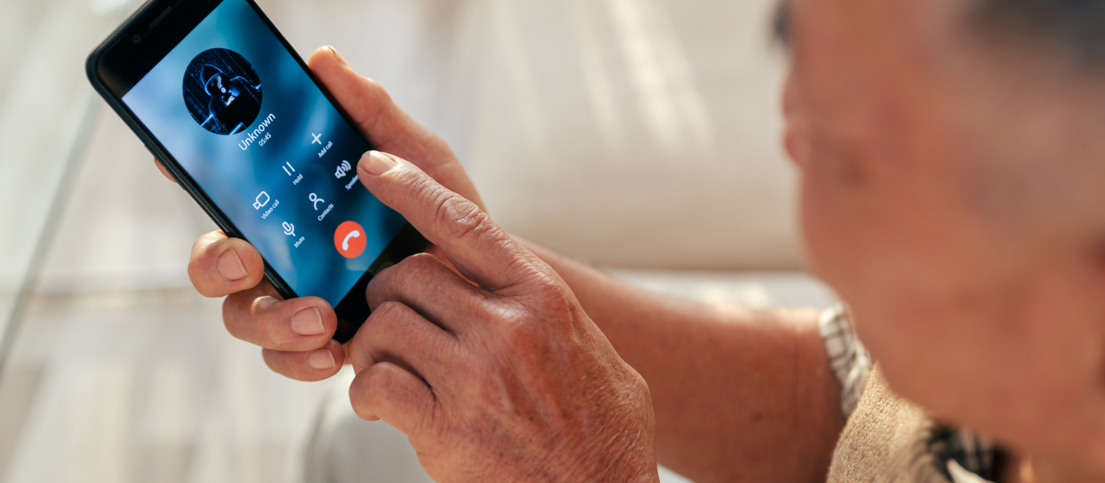 Old man accepting unknown caller