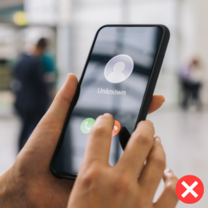 Person picking up unknown scam call